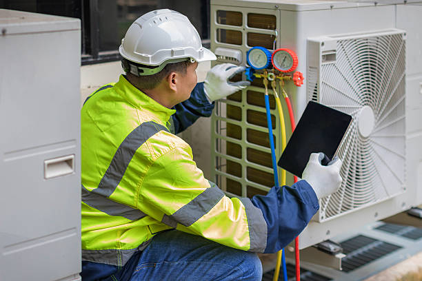 Professional Hvac technician working in Manakin Sabot, VA